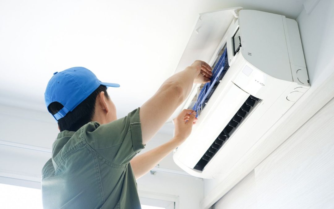 HVAC technician servicing a ductless mini split in Santa Paula