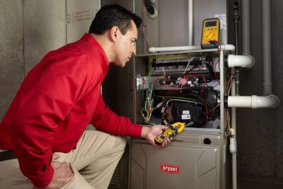 Furnace Repair Santa Paula Heating technician diagnosing a furnace repair in Santa Paula